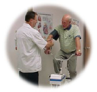 Doctor taking patient's blood pressure